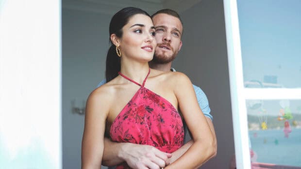 A couple embracing each other with Hande Ercel in a red dress, HD Desktop Wallpaper
