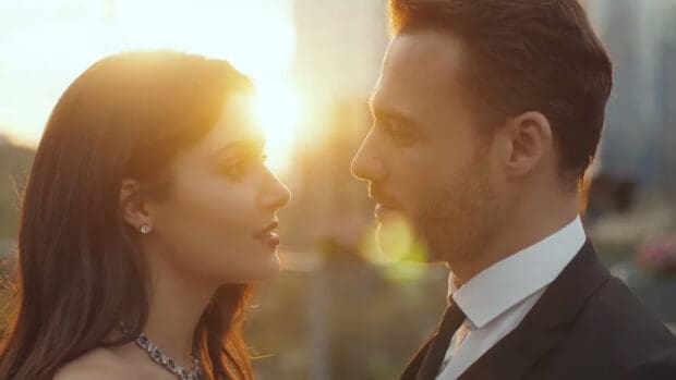 A romantic moment between Hande Ercel and a man at sunset, HD Desktop Wallpaper