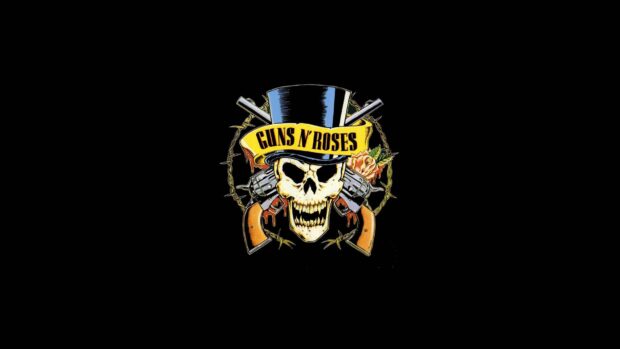 The image shows a skull with crossed guns and a top hat representing hard rock wallpapers, HD Desktop Wallpaper