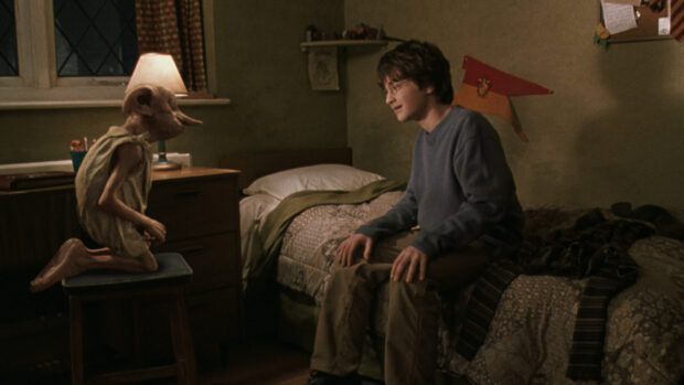 Harry Potter meeting Dobby in a dimly lit room from The Chamber Of Secrets, HD Desktop Wallpaper