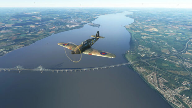 A Hawker Hurricane flying above a wide river and bridge over a lush green landscape, HD Desktop Wallpaper