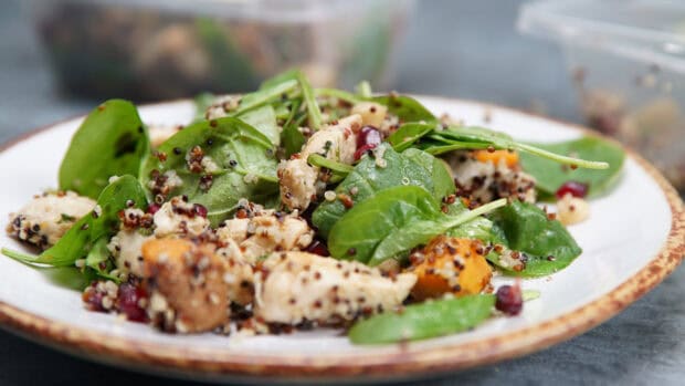 A close up of a healthy quinoa salad with spinach and grilled chicken on a plate, 4K Desktop Wallpaper