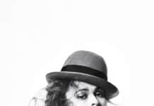 Helena Bonham Carter poses wearing a hat and fur collar in black and white, HD Phone Wallpaper