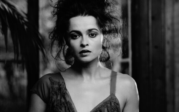 Helena Bonham Carter looks directly with a serious expression in this black and white photo, 2K Desktop Wallpaper
