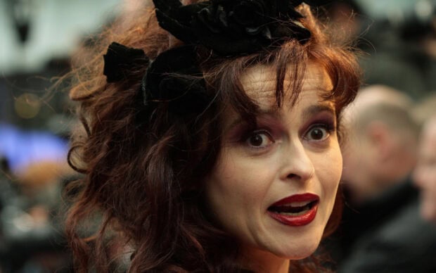 Helena Bonham Carter looks surprised with bold makeup and curly hair, 2K Desktop Wallpaper