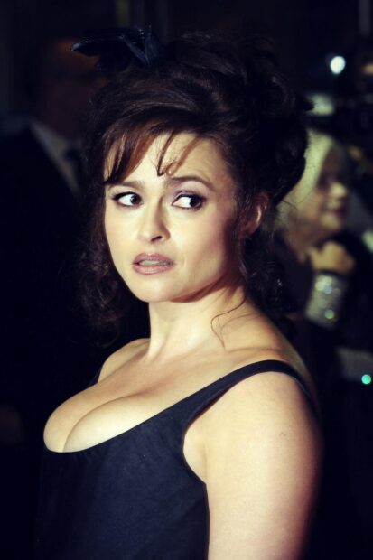 Helena Bonham Carter looks elegant in a black dress with a thoughtful expression, HD Mobile Wallpaper