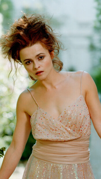 Helena Bonham Carter stands outdoors wearing a sparkling dress with curly hair, HD Phone Wallpaper