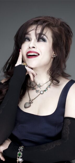Helena Bonham Carter is wearing a navy dress with black gloves and unique jewelry, 2K Mobile Wallpaper