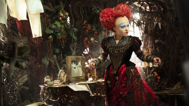 Helena Bonham Carter wears a detailed red and black theatrical dress with vibrant makeup, 4K Desktop Wallpaper