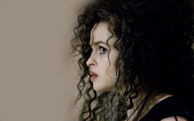 Helena Bonham Carter looks intensely focused in a close up side profile with curly hair, HD Desktop Wallpaper