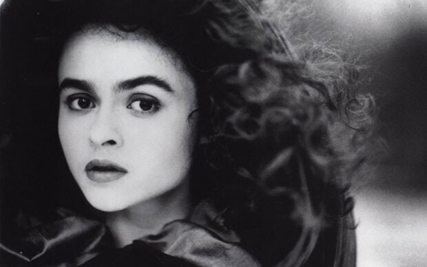 A black and white portrait of Helena Bonham Carter looking thoughtfully to the side, HD Desktop Wallpaper