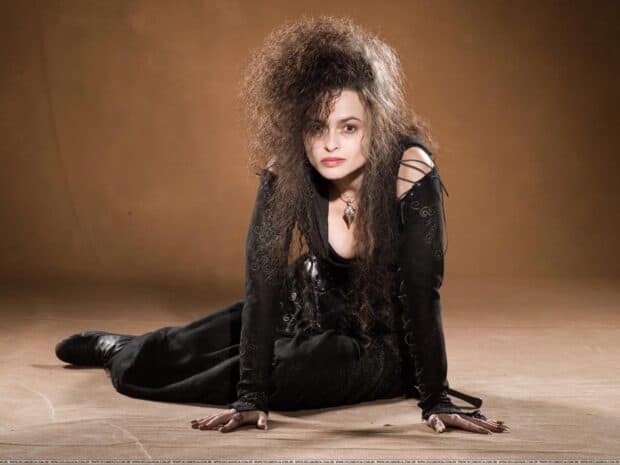 Helena Bonham Carter is sitting on the floor wearing a black dress with voluminous hair, HD Desktop Wallpaper
