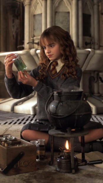 Hermione carefully examines a potion in the Chamber of Secrets, HD Phone Wallpaper