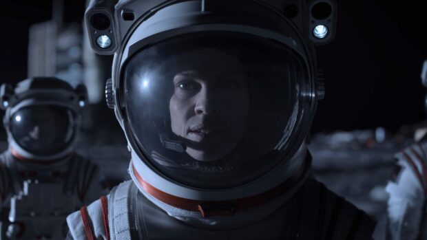 Hilary Swank appears focused in an astronaut suit on a lunar surface, HD Desktop Wallpaper