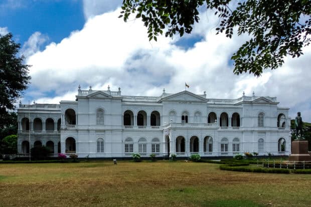 A large white museum building with arches and columns in Colombo Sri Lanka, 2K Desktop Wallpaper