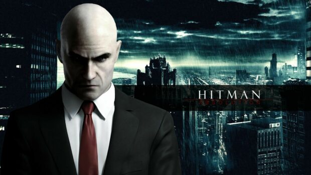 A man in a black suit and red tie stands with a serious look against a rainy cityscape, HD Desktop Wallpaper