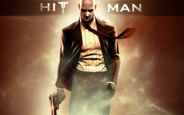 A man in a suit holding a gun surrounded by smoke from Hitman game series, HD Desktop Wallpaper