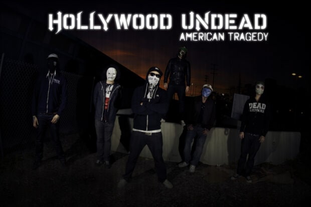 Hollywood Undead band members wearing masks stand together outdoors at dusk, HD Desktop Wallpaper