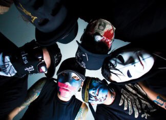 The Hollywood Undead band members wear distinctive masks and dark clothes in a group photo, HD Desktop Wallpaper