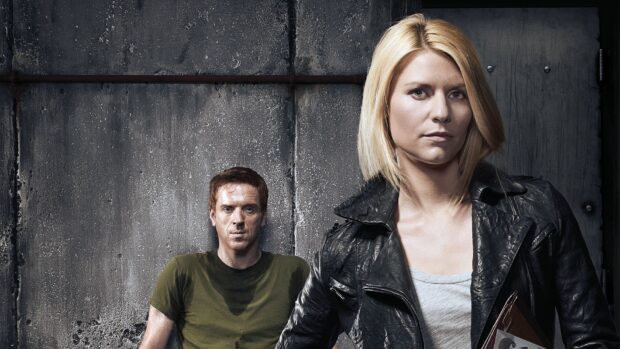 A man and a woman stand against an industrial wall in Homeland Wallpapers scene, HD Desktop Wallpaper
