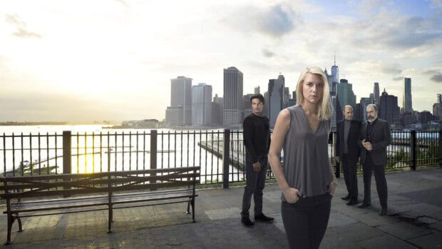 Four characters stand with city skyline in the background in Homeland Wallpapers, HD Desktop Wallpaper