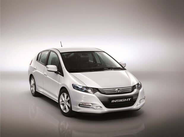 The Honda Insight hybrid car is shown at a slight angle with a clean white background, HD Desktop Wallpaper