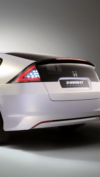 The Honda Insight features a sleek rear design with sharp taillights and a modern concept badge, 2K Phone Wallpaper
