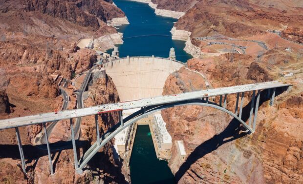 Aerial view of Hoover Dam and the Colorado River in a rocky canyon, HD Desktop Wallpaper