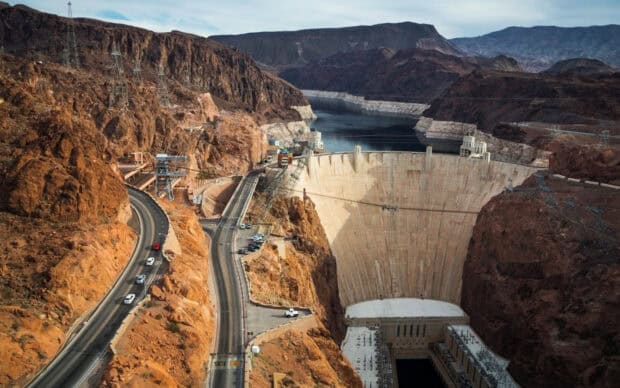 The Hoover Dam spans the Colorado River between steep rocky cliffs in the desert, HD Desktop Wallpaper
