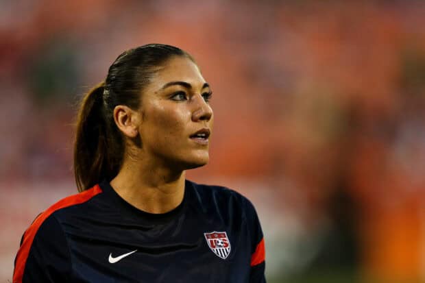 Hope Solo focused and ready in dark jersey, 2K Desktop Wallpaper