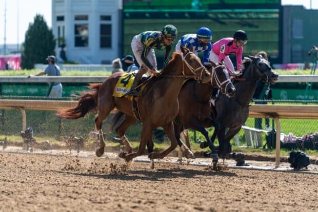 Jockeys are racing fiercely on horses during a competition, HD Desktop Wallpaper