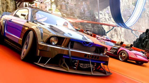 A group of Hot Wheels race cars speeds on an intense orange track with loops and cliffs in the background, HD Desktop Wallpaper
