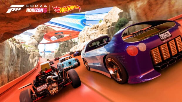A group of Hot Wheels race cars is speeding along the bright orange track in a rocky canyon setting, 4K Desktop Wallpaper