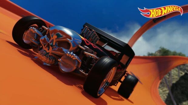 A Hot Wheels racing car with a skull front design speeds along the orange track, HD Desktop Wallpaper