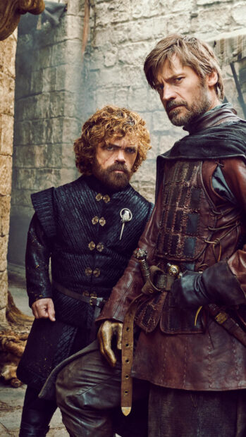 Two fierce men stand in a stone courtyard representing House Lannister, 4K Phone Wallpaper