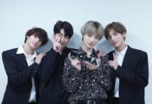 Huening Kai is holding an MGMA trophy with three friends smiling, HD Desktop Wallpaper