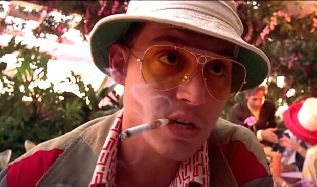 A close up of Hunter S Thompson wearing tinted glasses and smoking a cigarette, HD PC Wallpaper