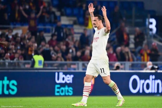 Zlatan Ibrahimovic raises his hands on the field wearing AC Milan kit, HD Desktop Wallpaper