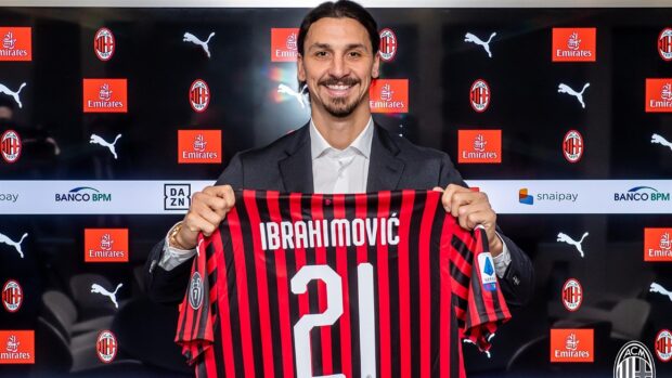 Zlatan Ibrahimovic proudly holding an AC Milan jersey with number 21 during the presentation, 2K Desktop Wallpaper