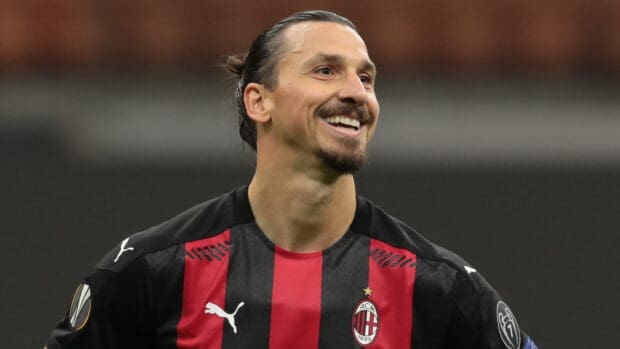 Zlatan Ibrahimovic is smiling during a match wearing his AC Milan jersey, HD Desktop Wallpaper