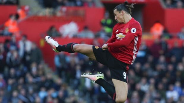 Zlatan Ibrahimovic is performing a strong kick during a match, HD Desktop Wallpaper