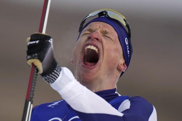 Iivo Niskanen showing intense emotion during a skiing event, 2K PC Wallpaper