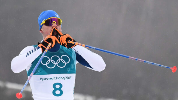 Iivo Niskanen is seen celebrating during a ski race, HD Desktop Wallpaper