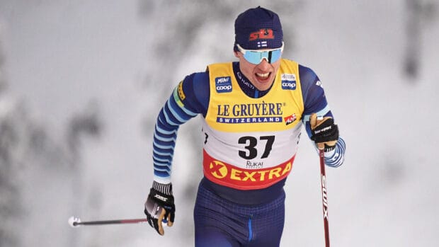Iivo Niskanen is skiing with full gear during a competition, HD Desktop Wallpaper