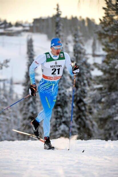 Iivo Niskanen wallpapers show a skier racing on snow with trees in the background, HD Mobile Wallpaper