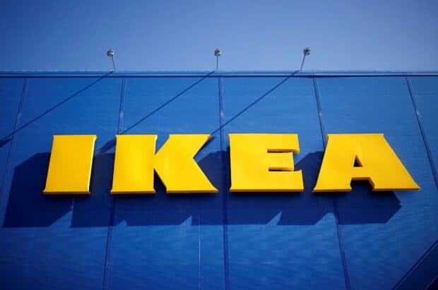 The Ikea logo is displayed prominently on a bright blue building facade, HD Desktop Wallpaper
