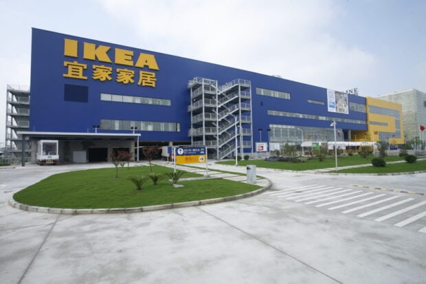The Ikea building with yellow logo is seen from outside on a sunny day, HD Desktop Wallpaper
