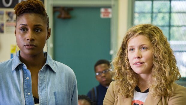 Two women have a serious conversation in a room from Insecure Tv Series, HD Desktop Wallpaper