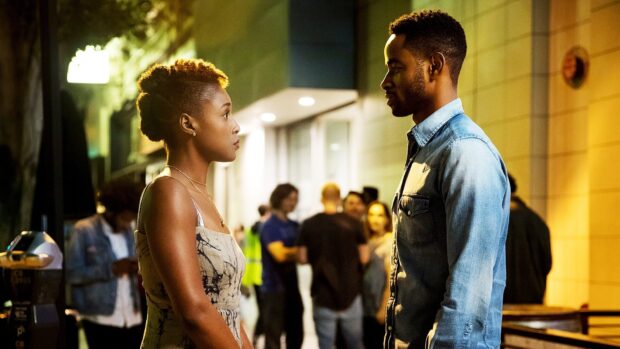 Two people from Insecure tv series having a serious conversation outside at night, HD Desktop Wallpaper