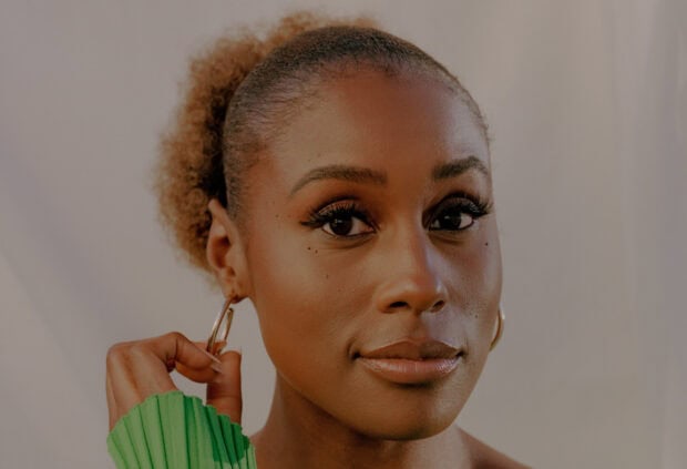 A close up portrait of a woman from the Insecure TV series wearing hoop earrings, HD Desktop Wallpaper